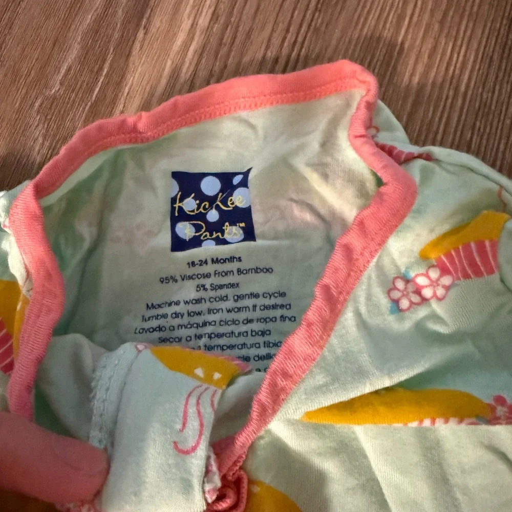 NWOT Kickee Pants Ruffle Pink and mint green pumkin pie footless romper 18-24m